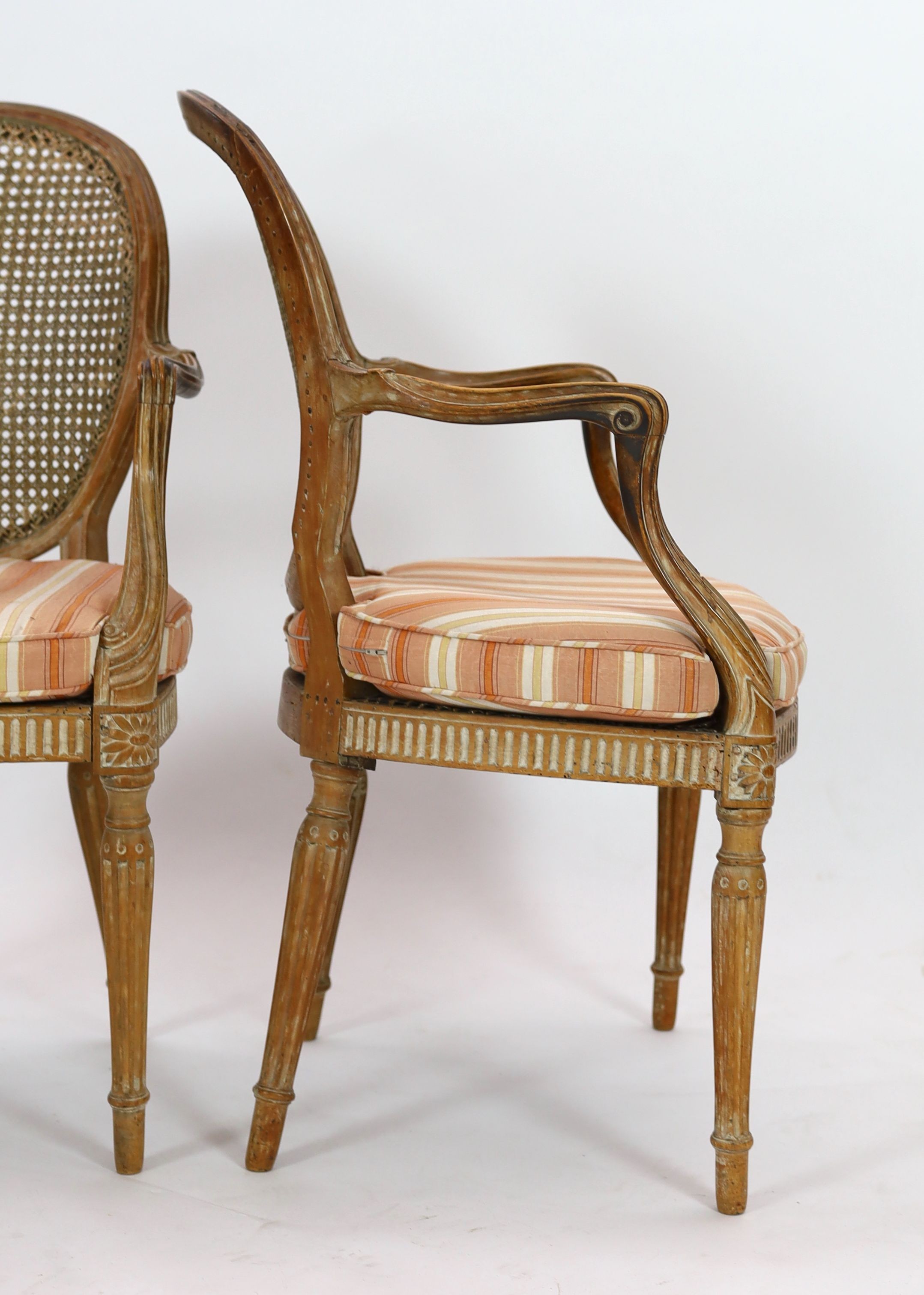 A set of four late 18th century French carved beech fauteuils, W.54cm D.53cm H.91cm